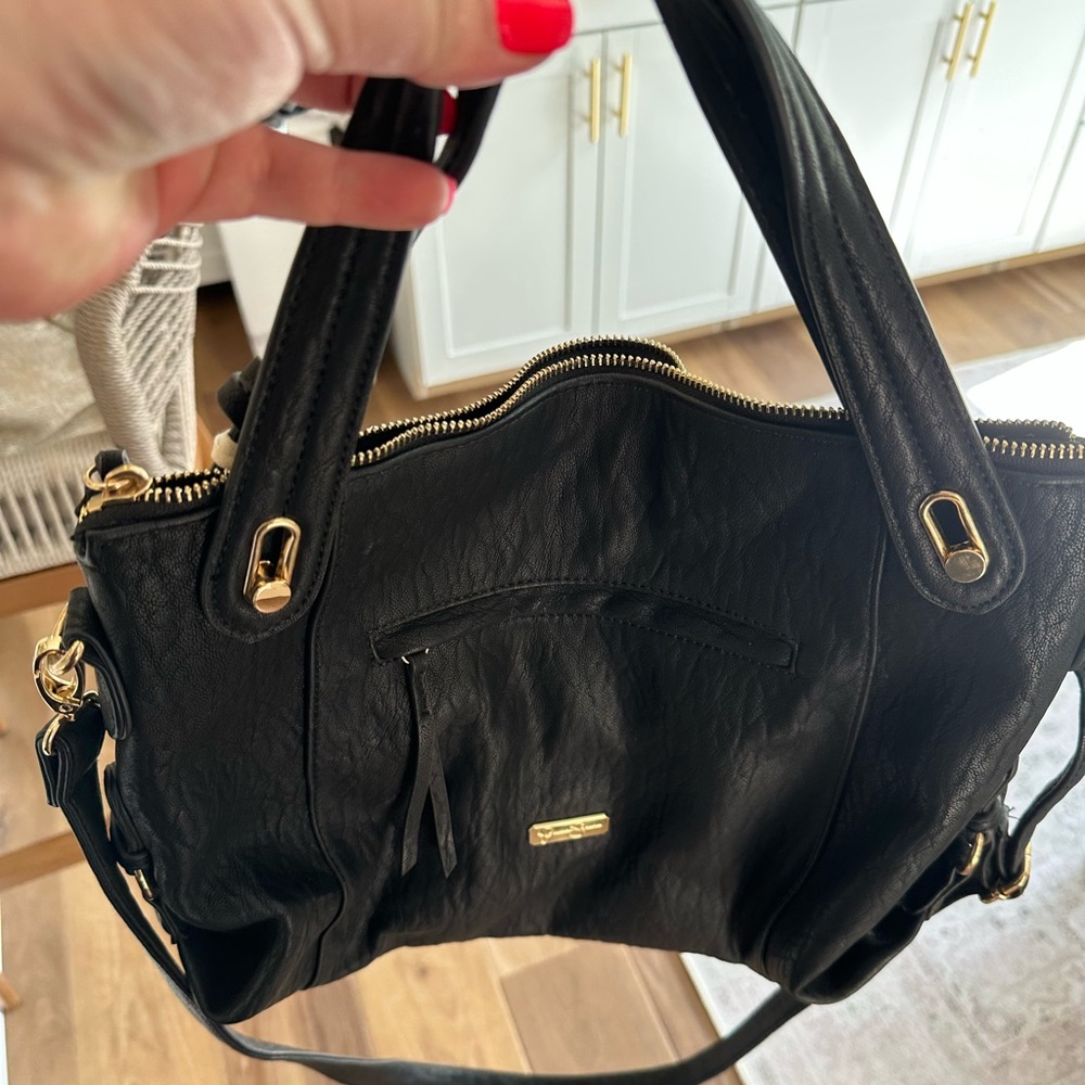 Jessica Simpson black crossbody bag with gold accents